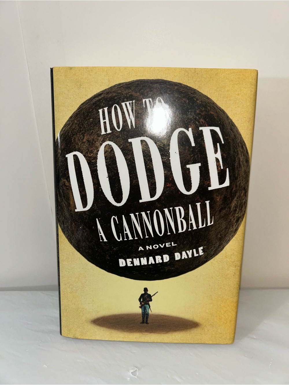How to Dodge a Cannonball by Dennard Dayle - Yellow & Brown Hardcover